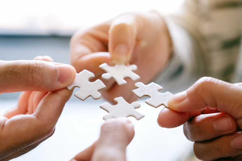 A collaborative puzzle-building scene